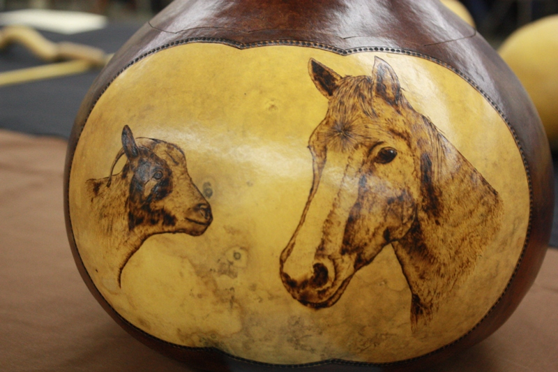 Horse and sheep crafted on gourd